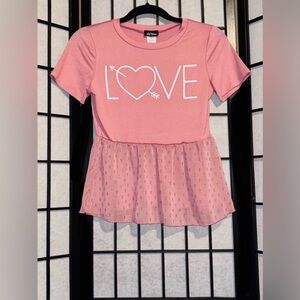 Fashion Magazine Pink Graphic Short Sleeve Peplum top W/ chiffon ruffle. Small